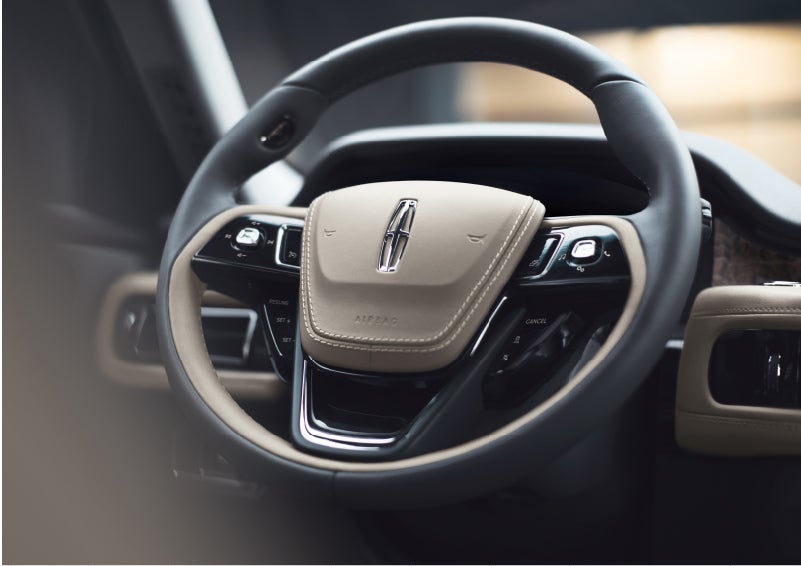 The intuitively placed controls of the steering wheel on a 2023 Lincoln Aviator® SUV | Gray-Daniels Lincoln in Brandon MS