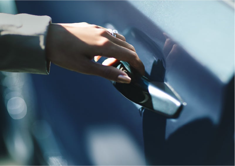 A hand gracefully grips the Light Touch Handle of a 2023 Lincoln Aviator® SUV to demonstrate its ease of use | Gray-Daniels Lincoln in Brandon MS