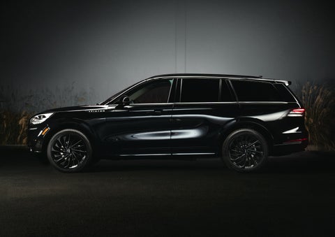 A 2024 Lincoln Aviator® SUV is shown in the Infinite Black exterior color | Gray-Daniels Lincoln in Brandon MS