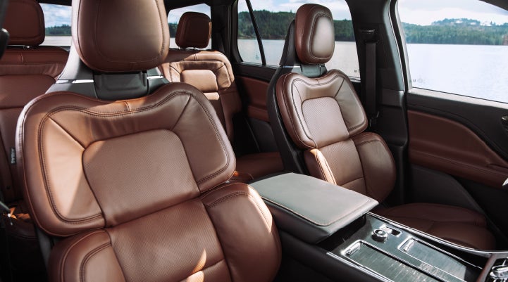 The front row's Perfect Position Seats in a 2024 Lincoln Aviator® Reserve model with Ebony Roast interior | Gray-Daniels Lincoln in Brandon MS