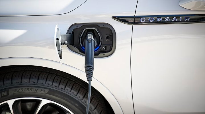 An electric charger is shown plugged into the charging port of a Lincoln Corsair® Grand Touring
model. | Gray-Daniels Lincoln in Brandon MS