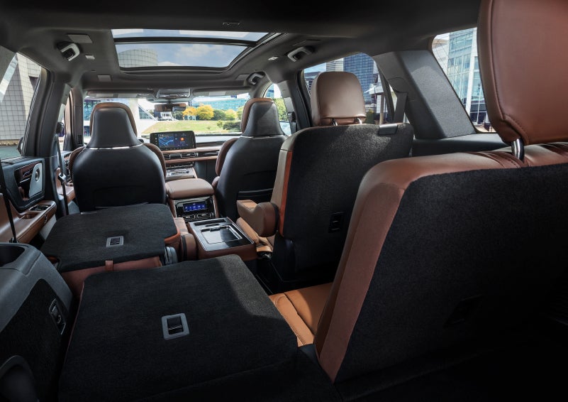 The interior of the 2025 Lincoln Aviator® SUV is shown with two seats folded down for added space. | Gray-Daniels Lincoln in Brandon MS