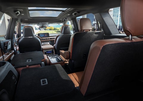 The interior of the 2025 Lincoln Aviator® SUV is shown with two seats folded down for added space. | Gray-Daniels Lincoln in Brandon MS