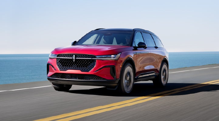 A 2025 Lincoln Nautilus® SUV is being driven on a seaside roadway. | Gray-Daniels Lincoln in Brandon MS